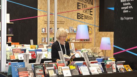 Woman browsing through books