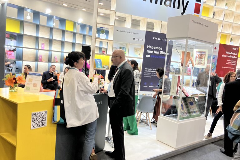 German Stand at fair in Guadalajara 2023 with people on site